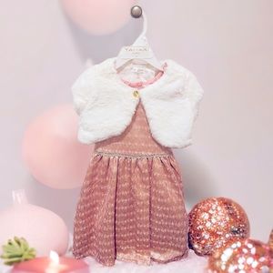 This is a gorgeous dress from Tahari. It is a size 3T. It has never been worn.